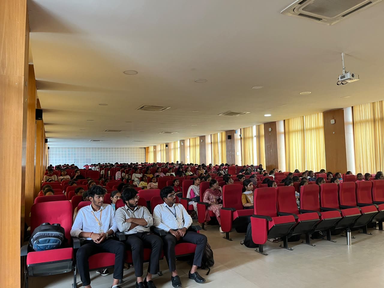 Students filling an auditorium for the Japanese language orientation